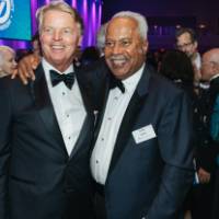 John James with guest at Enrichment.